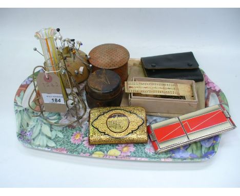 A Tray of sundry items , hat pins, ivory or bone game counters and markers, manicure set, an Art Deco folding compact, etc.