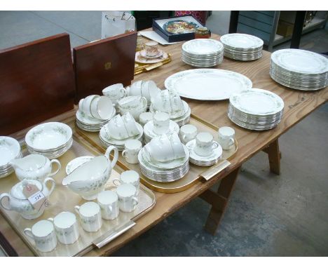 An Extensive Wedgwood " Westbury" tea and dinner service comprising sugar basin , sauce boat, dinner , side and meat plates, 