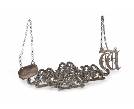 TWO EDWARDIAN SILVER BELT BUCKLESmaker Grey & Co, Birmingham 1904; along with three Victorian silver decanter labels, maker  