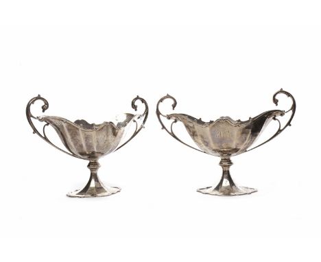 PAIR OF GEORGE V SILVER COMPORTS maker R &W Sorley, Glasgow 1912, with handles and scrolling detail around scalloped rim and 