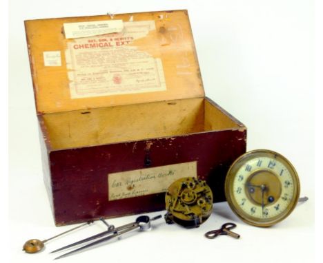 A QUANTITY OF CLOCK PARTS INCLUDING TWO MOVEMENTS, A BAROMETER, PENDULUMS, BRASS DIVIDERS, ETC IN A PAINTED DEAL BOX