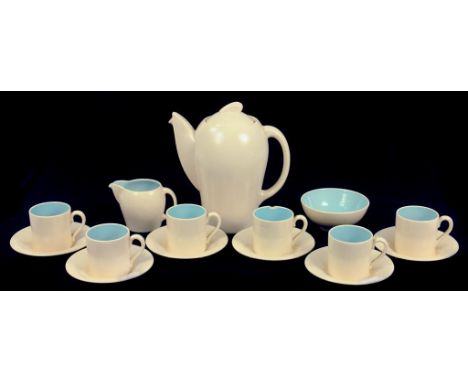 A SUSIE COOPER BLUE AND BEIGE EARTHENWARE COFFEE SET, PRINTED CROWN WORKS MARK AND FACSIMILE SIGNATURE, 1930S