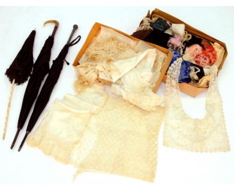 A COLLECTION OF VICTORIAN BOBBIN AND OTHER LACE   to include collars, lace edged garments, trim,  a silver handled umbrella a