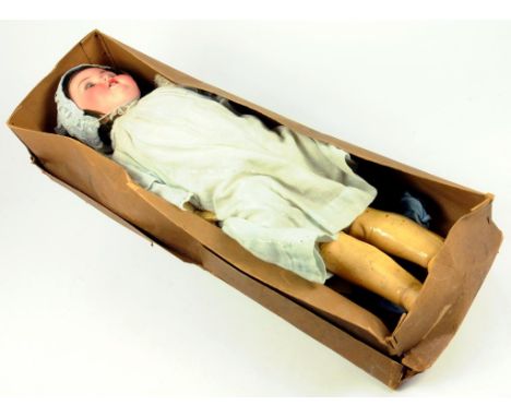 A GERMAN BISQUE HEADED CHARACTER DOLL WITH JOINTED COMPOSITION BODY IN ORIGINAL CARD BOX, EARLY 20TH C