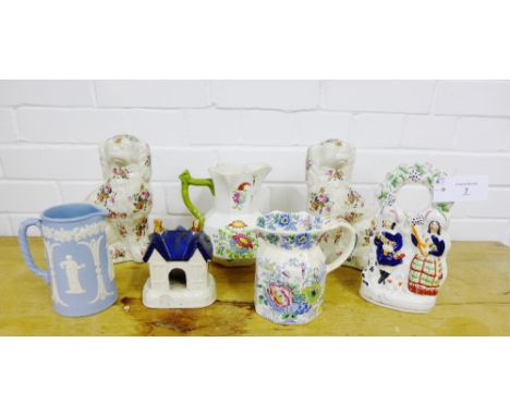 A collection of Staffordshire potteries to include a flat back figure, a pastel burner, a Masons jug and another, a pair of c