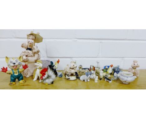 A collection of Wade and other animal figures, together with a small model of a cottage (a lot)