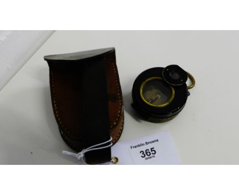 A compass in leather case 