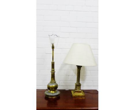 A brass corinthian column table lamp and shade, together with a brass baluster table lamp (2) 