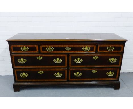 A mahogany chest, the moulded rectangular top above an arrangement of one long and two short drawers over a double bank of tw
