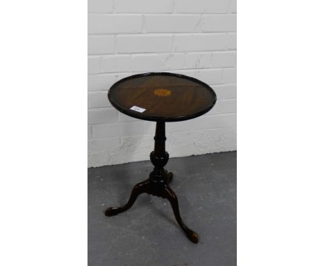 A mahogany tripod table, 49 x 33cm