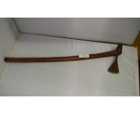 Early 20th century African axe with carved handle and decorated blade overall length 47 cms