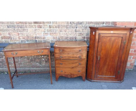 A SMALL REGENCY BOWFRONT NIGHT COMMODE WITH DUMMY DRAWERS ebony stringing (unconverted), a George III fruitwood hanging corne