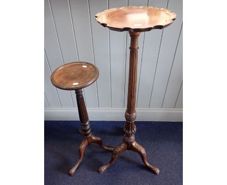 A GEORGE III STYLE MAHOGANY TORCHERE with 'pie crust' top and carved tripod base 105cm high, and a shorter mahogany torchere 