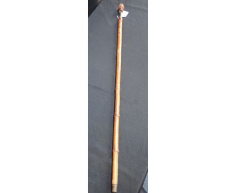 A BAMBOO HORSE MEASURING STICK with root handle