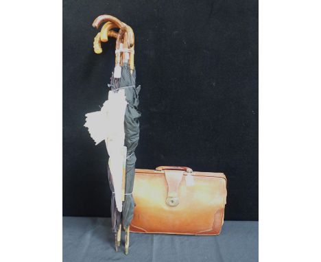 A COLLECTION OF VINTAGE UMBRELLAS one with silver collar, with a parasol and parasol handle, and a leather briefcase