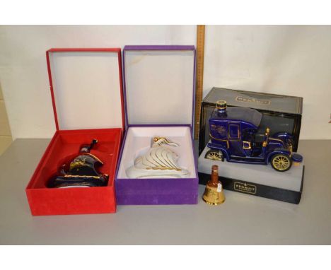 A Limoges porcelain Larsen Cognac of the Vikings boxed decanters, one with contents the other empty together with Renault Cog