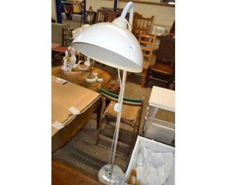 Metal framed adjustable floor standing lamp