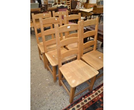 A set of six ladder back kitchen chairs