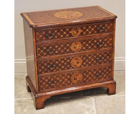 A Dutch influence 18th century style marquetry inlaid walnut chest of drawers, late 20th century, the rectangular moulded top