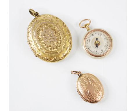 An early 20th century gilt metal oval locket, the engraved locket with vacant cartouche and flower detail, opening to reveal 