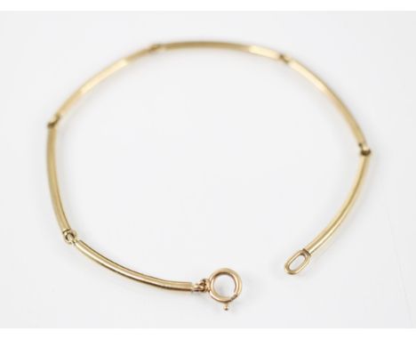 A 9ct yellow gold bracelet, with six curved spherical bars, with bolt ring fastening, stamped ‘375’ possibly 1978, overall le