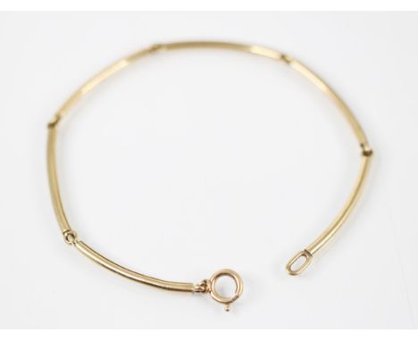 A 9ct yellow gold bracelet, with six curved spherical bars, with bolt ring fastening, stamped ‘375’ possibly 1978, overall le