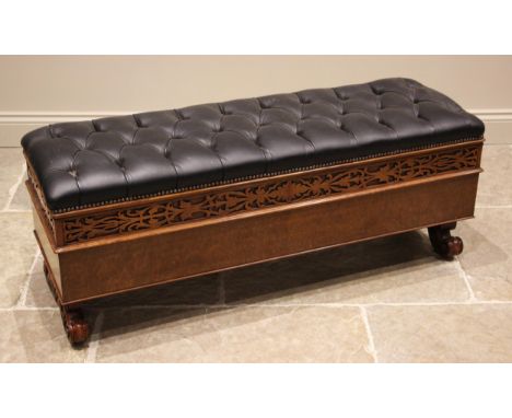 A Victorian walnut box duet stool, the button back upholstered leather and hinged seat opening to a vacant interior, over a b