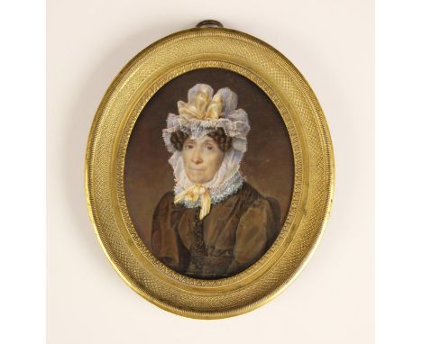 English school (early 19th century),An oval portrait miniature depicting an old lady in an elaborate lace bonnet,Watercolour 