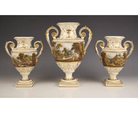 A garniture of three Bloor Derby vases, 19th century, each urn shaped vase with acanthus moulded handles elaborately gilt hig