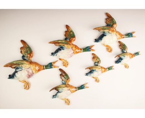 A set of four graduated Beswick wall ducks, model numbers: 596-1 (glazed loss to tip of right wing), 596-2, 596-3, 596-4, eac
