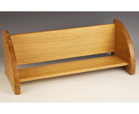 A Colin 'Beaverman' Almack light oak book trough, carved with a signature beaver to one end, 53cm wide 