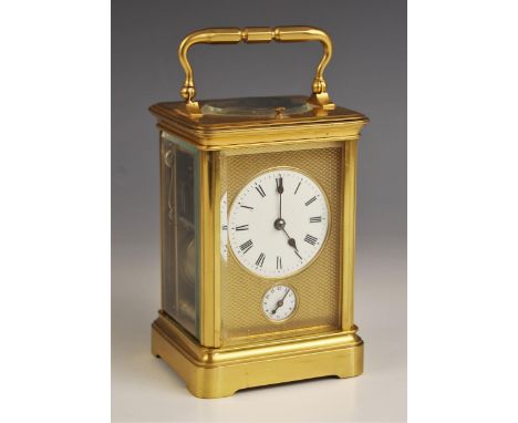 An early 20th century brass cased repeater carriage clock, with slow/fast indicator, 5cm enamelled dial applied with Roman nu