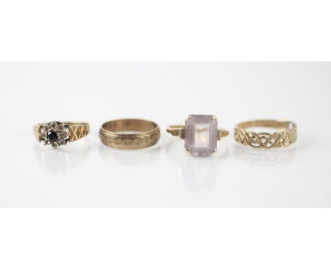 A selection of three 9ct yellow gold rings, including a 1970's style blue and white stone cluster ring, with star engraved de