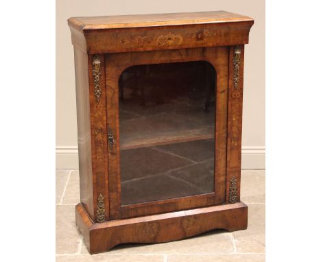 A Victorian rosewood and crossbanded pier cabinet, the book veneered top with a moulded edge over a frieze inlaid with 'C' sc