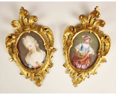 English school (early 19th century),A bust length portrait plaque depicting a lady gazing at a portrait miniature,Enamel on c