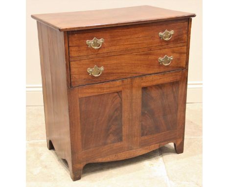 An early 19th century mahogany commode chest, the hinged top with drop front moulded as two faux drawers, upon bracket front 