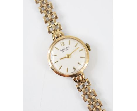 A 9ct yellow gold ladies Record De Luxe wrist watch, the circular white dial with Arabic numerals and baton markers, 2cm wide