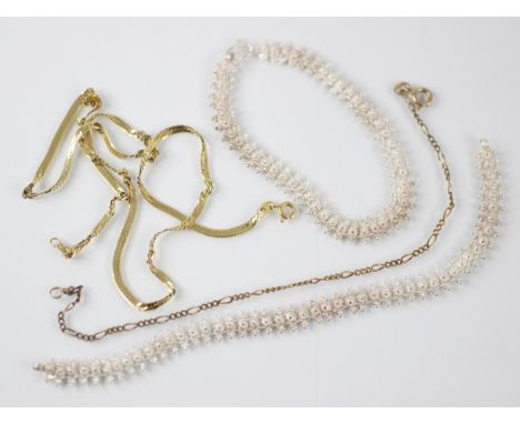 A selection of jewellery, including a yellow metal figaro bracelet, with bolt ring fastening stamped '9k' with a snake link n