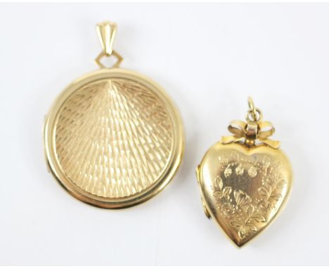A 9ct yellow gold circular locket, the locket with engine turned detail to front and plain polished reverse, opening to revea