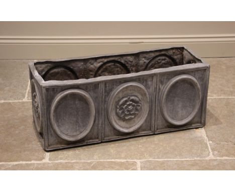 A lead planter trough, of rectangular form, cast in relief with oval panels punctuated with a Lancashire rose motif, 33cm H x