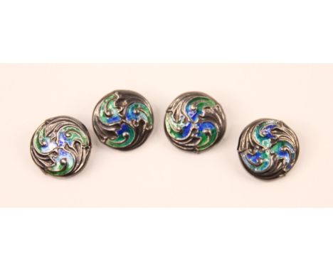 A set of four Edwardian Arts and Crafts silver and enamel buttons, William Hair Haseler, Birmingham 1906 probably for Liberty