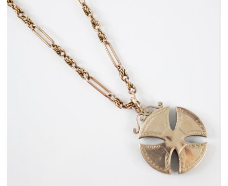 A yellow metal figaro style chain, with attached lobster and bolt ring clasp, stamped '9ct' suspending a Victorian yellow met