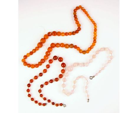 A strand of untested carnelian beads, the necklace designed as sixty-four naively strung graduated faceted circular beads 59c