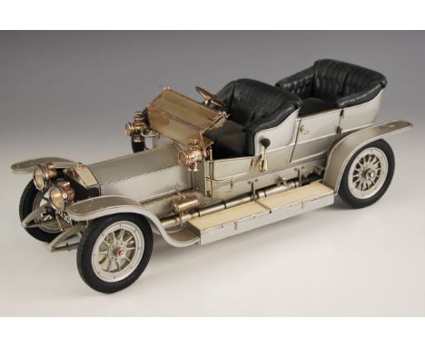 A Franklin Mint 1/12 scale Connoisseur Series model of a 1907 Rolls Royce Silver Ghost, premier edition, with a silver livery