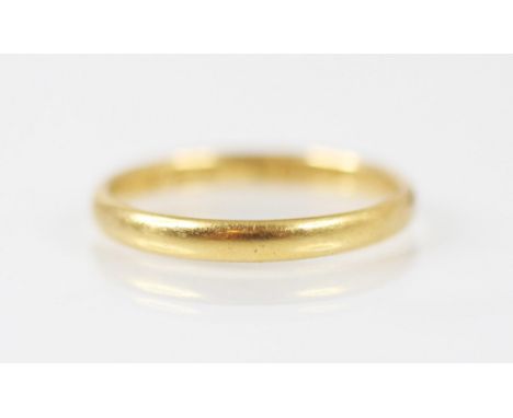 A 22ct yellow gold wedding band, stamped ‘CG&amp;S’ Birmingham 1935, ring size M 1/2, 2.5gms 