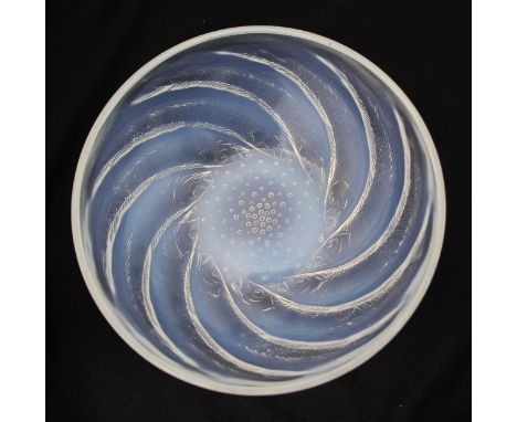 A Lalique 'Poisson' opalescent glass bowl, 20th century, the circular bowl formed of stylised moulded fish, the interior moul