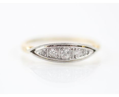 An early 20th century diamond ring, the five graduated mixed cut diamonds within white metal lozenge shaped head with openwor