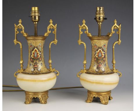 A pair of onyx and champleve enamel table lamps, late 19th century, each of squat baluster form, the necks extensively enamel