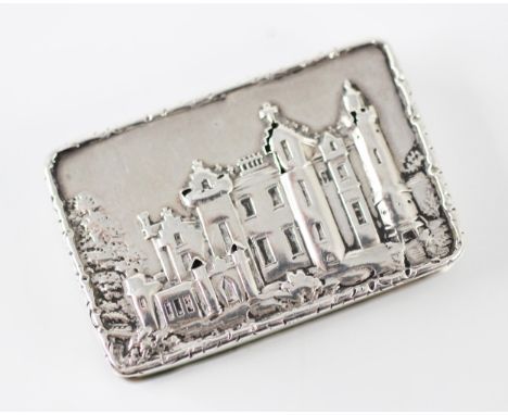 A Victorian silver vinaigrette, Nathaniel Mills, Birmingham 1838, the hinged cover with cast depiction of Abbotsford castle a
