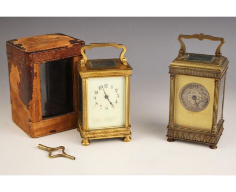 A French brass cased carriage timepiece, early 20th century, the case with fluted columns flanking the 5cm silvered dial cent